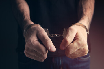 men handcuffed in criminal concept