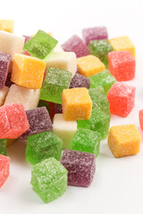 Colored candy bars on a white background