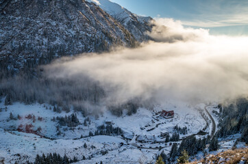 Capra chalet in Fagaras mountains in winter. The ridge of the mountain full of snow. There are one of the beautiful road in the world, Transfagarasan, chalet
