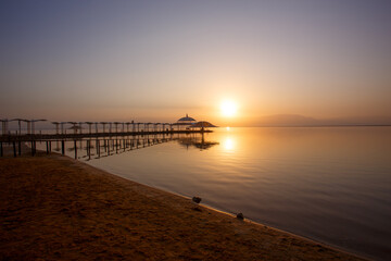 Fototapeta na wymiar Dead Sea cost in Israel during sunset 