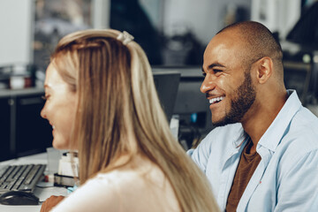 Man and woman having a talk in office