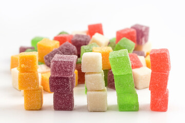 Colored candy bars on a white background