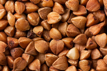 Buckwheat background. Closeup view. Healthy food concept.