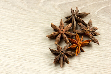 Fototapeta na wymiar Star anise exotic spice on a wooden table