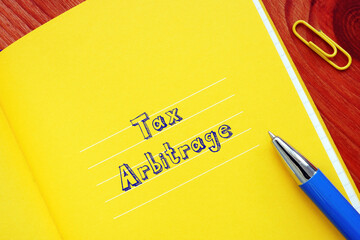 Conceptual photo about Tax Arbitrage with written phrase.