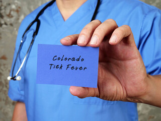 Health care concept meaning Colorado Tick Fever with inscription on the piece of paper.