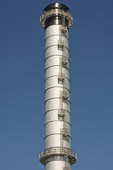 Power station chimney on seafront, Shoreham Harbour, England