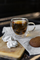 Homemade biscuits and a cup of tea on the table in the morning