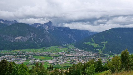 Fototapeta na wymiar Beautiful panorama view of town Lienz, Tyrol, Austria, a popular tourist destination, located in valley at rivers Isel and Drau with snow-capped mountains of the rugged Gailtal Alps (Lienz dolomites).
