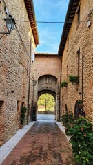 Ancient entrance door the castle of San Mariano, Umbria, Italy.