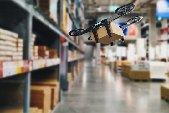 Concept industry 4.0 robotic drone artificial Intelligence,autonomous Robot of warehouse logistic,smart automated delivery vehicle,modern storehouse shipping,with robot carrier carrying cardboard box