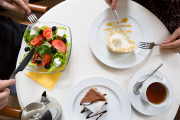 People having lunch in a cafe