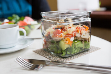 Glass bowl of fresh caesar salad