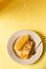 Honey on the yellow background 