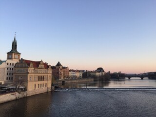Fototapeta na wymiar Prague Charles Bridge, the old town in the afternoon in Spring. Sunset time in Prague 