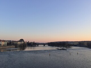 Prague Charles Bridge, the old town in the afternoon in Spring. Sunset time in Prague 