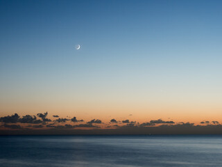 Moon Earthshine at Dusk over English Channel