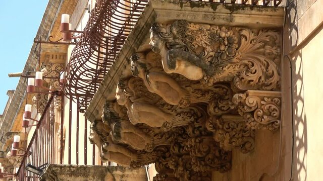 Sicily, Noto town the Baroque Wonder - UNESCO Heritage Site. Detail of Palazzo Nicolaci balcony, the maximum expression of the Sicilian Baroque style.