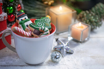 Christmas cookies in a bowl and festive decor on wooden, Christmas cookies with festive decoration