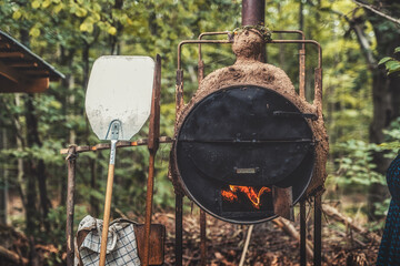 clay kiln in nature from statues of women.