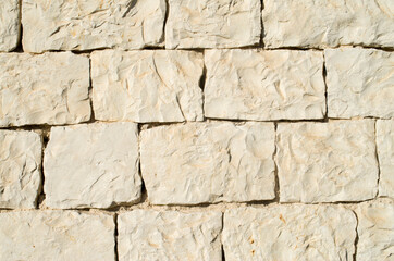Old white stone wall  closeup