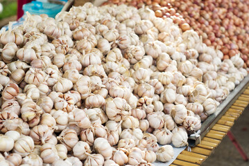 Lots of organic garlic on the stalls at thailand market