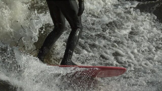 Extreme sports surfing slow motion water on surf board and surfer