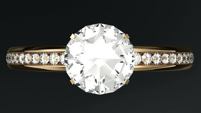Top View of Golden Ring with Diamonds on black studio background. 4K Loop Animation