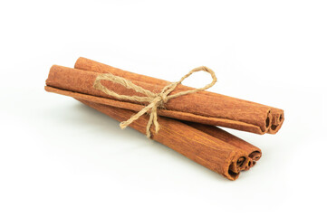 Cinnamon sticks isolated on white background, healthy spice, (Cinnamomum)