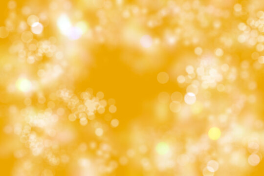 Gold festive background with bokeh to decorate any surface. Packaging.