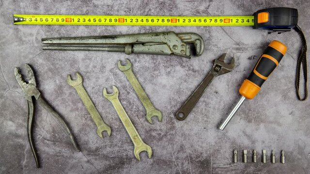 Stop motion animation. Old hand tools are moving on the table