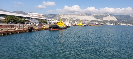 September 14, 2020 Novorossiysk Russia: Towboats with yellow deckhouses stand in the bay of the...