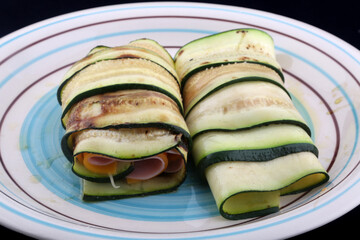 zucchini filled with ham and cheese as healthy snack