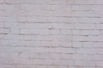 texture of old brick wall plaster on the wall of a street house