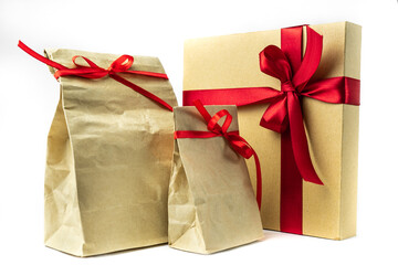 Gift wrapping made of Kraft paper . Isolated on a white background