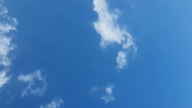 4K Cumulus Clouds Timelapse against blue sky