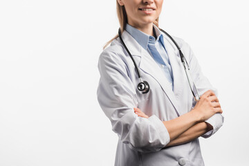 cropped view of nurse in white coat standing with crossed arms isolated on white