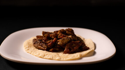 Dishes with roasted meat and vegetables