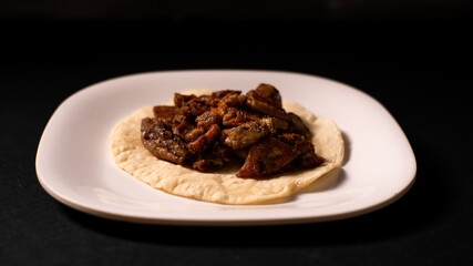Dishes with roasted meat and vegetables