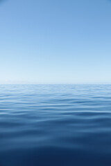 Vertical shot of a blue sea