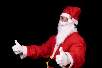 man with down syndrome dressed as santa claus on black background