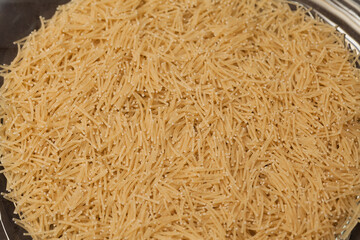 close-up raw noodle kernels