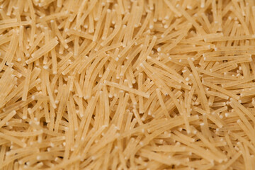 close-up raw noodle kernels
