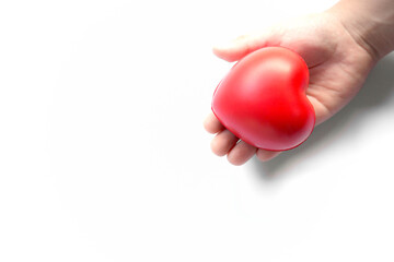 red heart in the children's arm, white background