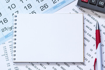 Fototapeta premium Abstract calendar close up background. Business concept written on notepad with space.
