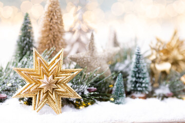 Christmas ornament with string lights on blue background.