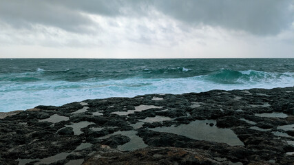 Turquoise Waves crashing on cliffs Ireland Aran Islands Inishmore