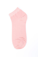 one pink short sock on a white background, top view