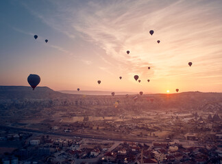 Hot air balloon in Cappadocia on the sunrise.