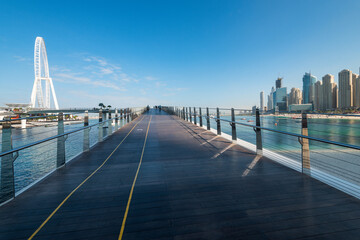 Pedestrian bridge to BlueWaters Island and Dubai Ain. Free space for text